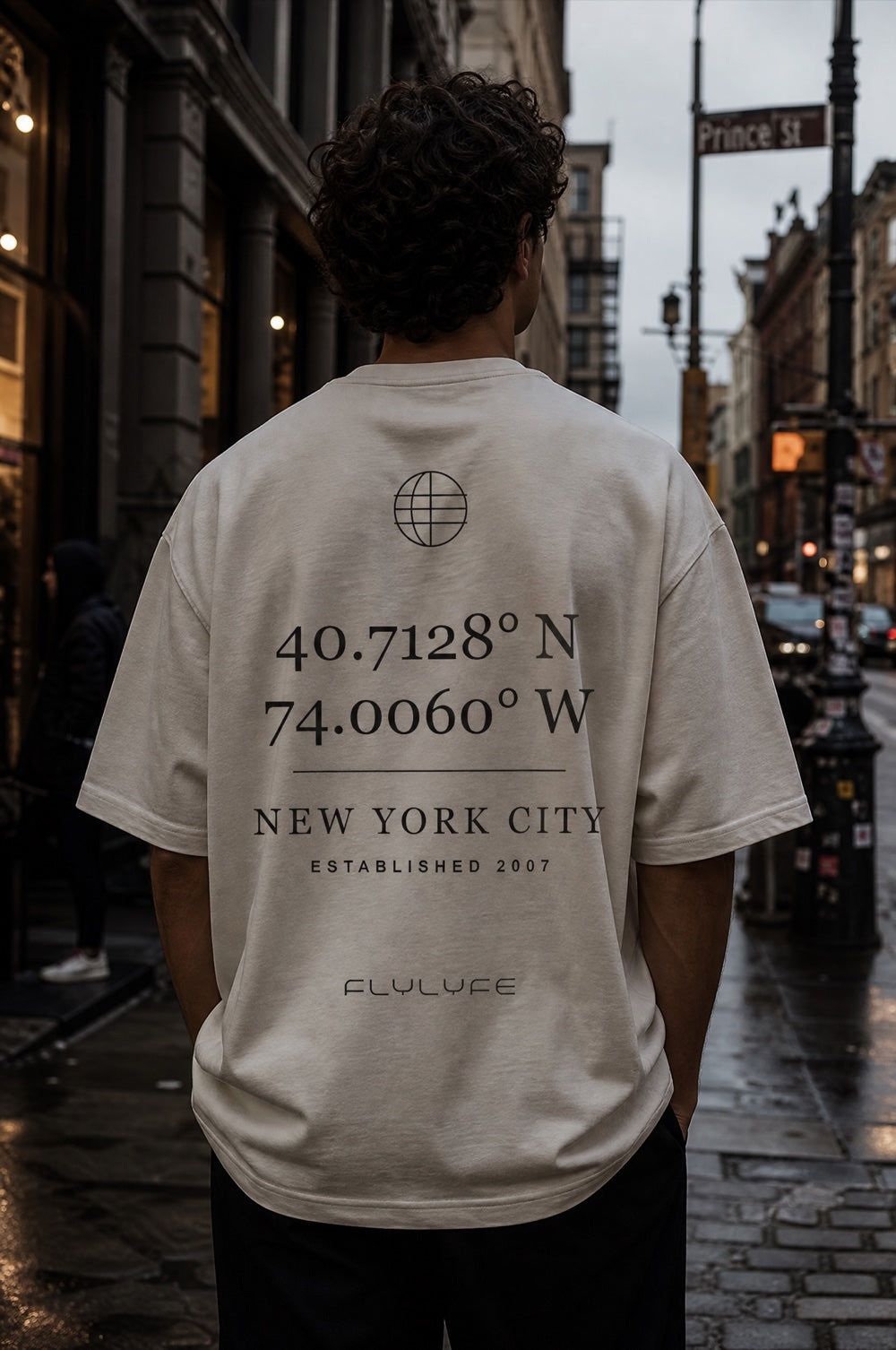 The Coordinates Tee worn on a model — FLYLYFE NYC latitude longitude tee